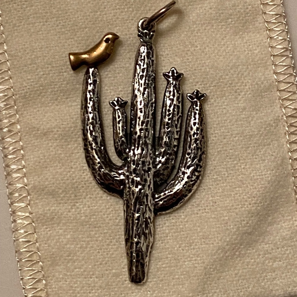 Cactus charm about 2 inches long.